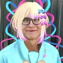 A man wearing a bright pink and blonde anime-style wig with colorful hair clips looks directly at the camera with a serious …