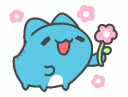 Bugcat Capoo, a blue cartoon cat-like creature, smiling happily while holding a pink flower.