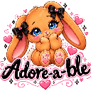 A cute brown bunny with black bows in its ears holding its paws to its face, surrounded by pink hearts and the text Adore-a-…