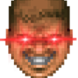 A pixelated human face with glowing red laser beams shooting from its eyes.