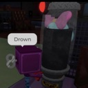 A purple block character stands next to a tall object with a speech bubble that says Drown.