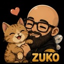 A bald man with glasses and a beard smiling while hugging a happy tabby cat with a small heart floating above them.