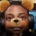IShowSpeed with a digital bear ear and nose filter on his face.