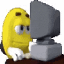Yellow M&M character sitting at a computer screen cycling through various shocked and confused facial expressions.