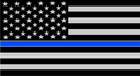 A grayscale American flag with a single horizontal blue stripe across the center.