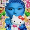 Ariana Grande with blue skin as a Buddha figure holding a Hello Kitty plush toy.