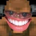 A pixelated face with a disproportionately large and realistic human mouth grinning widely.