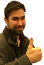 Man with a beard smiling and giving a thumbs-up gesture.