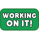 A green rectangular sign with white text that reads Working On It.