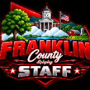 A red and black badge featuring a courthouse, a tree, a farm, and an American flag with the text Franklin County Staff.