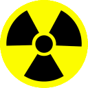 Four yellow circles with black radiation hazard symbols arranged in a horizontal row.