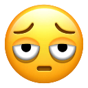 Face with heavy bags under its eyes looking tired and unimpressed.