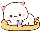 A white cat lying on a yellow cushion while looking at a purple smartphone.