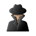 A faceless figure wearing a black fedora and a dark trench coat with the collar turned up.