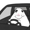 A white triangular creature with a pink nose smiling while holding a car steering wheel.