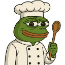 A green frog character wearing a white chef hat and uniform, holding a wooden spoon.