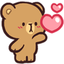 A cute brown bear blowing a pink heart kiss with a happy expression.