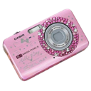 A pink compact digital camera with a rhinestone-encrusted lens ring.