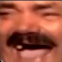 El Risitas laughing with his head tilted back and mouth wide open in a joyful expression.