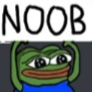A green frog character with a smug expression and hands raised, with the word NOOB written in black text above it.