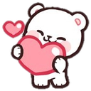 A small white bear with a happy expression holding a large pink heart with a smaller heart floating nearby.