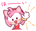 A pink cat-like character waving its hand with a joyful expression and Japanese text above its head.