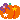A pixel art orange squash decorated with yellow stars and a purple magical accent.
