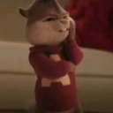 Alvin the chipmunk wearing a red sweater with his hand on his chin looking skeptical.