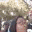 A group of people taking a blurry, high-energy selfie together.