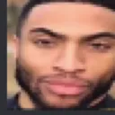 Man with a deadpan, unimpressed expression looking directly at the viewer.