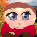 A cartoon character with very large blue eyes and a soft expression rests their chin on their hand.