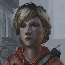 A young woman with short blonde hair looking forward with a neutral, blank expression.