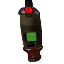 Industrial terminal control panel with a glowing green screen and a red warning light above a valve.