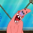 Patrick Star laughing with his mouth wide open and eyes squinted.