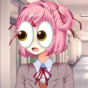 Anime girl with pink hair and a school uniform featuring comically large, round googly eyes.