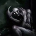 A dark, gray humanoid figure with glowing white eyes clutches its head in a state of intense screaming and panic.
