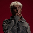 Person with bleached hair making a shushing gesture with their finger against a dark red background.