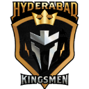 A golden shield emblem featuring a silver helmet and a golden crown.