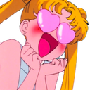 Sailor Moon with large pink heart-shaped eyes and a blushing, excited expression.