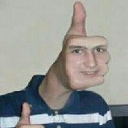 A person's face digitally warped into the shape of a hand giving a thumbs up gesture.