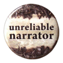 A round chocolate-dipped cookie with the words unreliable narrator printed on the center.