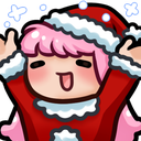 A character with pink hair wearing a Santa hat and suit, smiling with their tongue out while surrounded by sparkles.