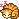 A small orange tabby cat curled into a ball sleeping with pink Zzz symbols floating above its head.