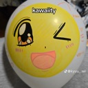 A yellow circular face with a wide happy mouth and a winking anime eye.
