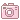 Three pink pixel art cameras arranged in a row, with the third camera featuring a yellow sparkling star icon above it.