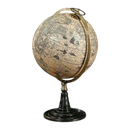 A vintage globe sits on a dark stand against a black background.