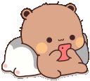 A cute brown bear lying on a pillow while holding a pink smartphone and looking at the screen.