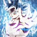 Goku with silver hair and a glowing blue aura reaching forward with a serious expression.