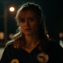 Young woman with a concerned and nervous expression on her face.