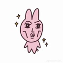 A pink cartoon rabbit with an exaggerated, chiseled jawline and intense expression surrounded by sparkling stars.